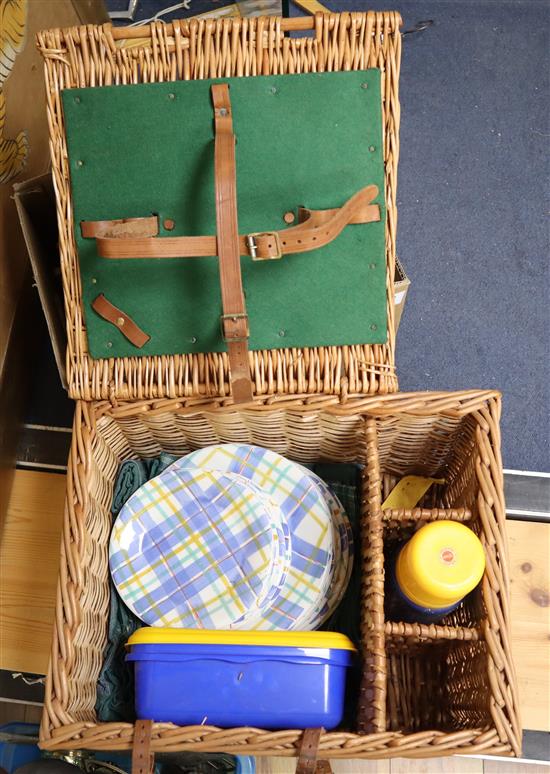 A modern Jacques croquet set, cased and a picnic set in a wicker basket with bottle compartments